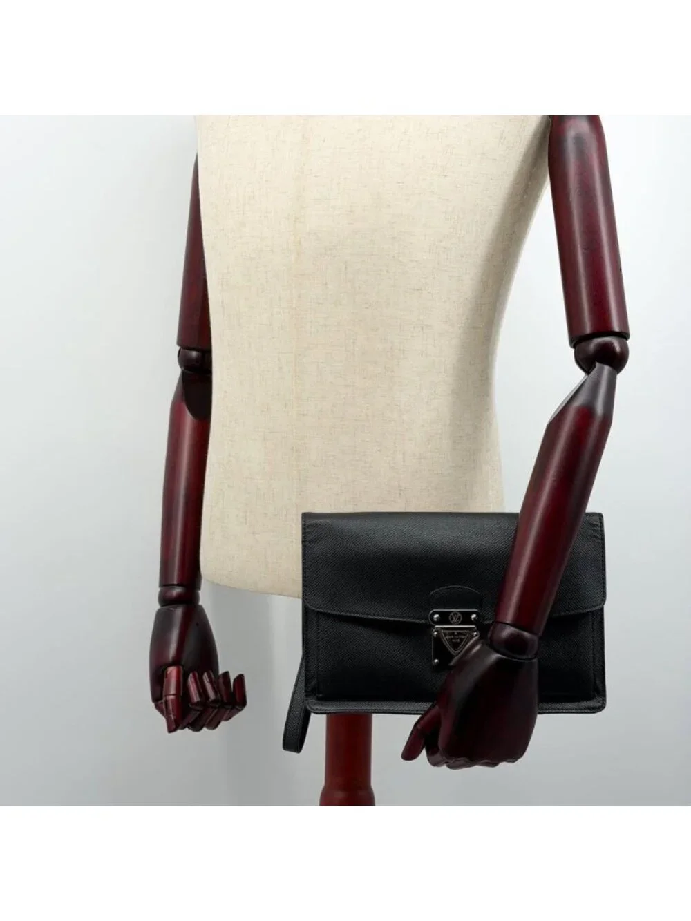 Louis Vuitton Belaia Taiga Clutch Leather